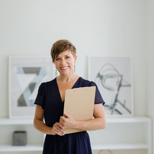 Portrait of a smiling, confident woman, the yoga mentor.